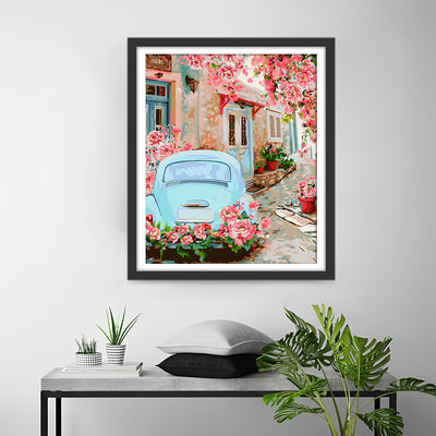 Blaues Auto unter rosa Blumenbaum Diamond Painting