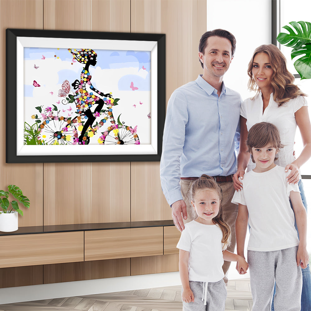 Das Mädchen fährt ein Blumenfahrrad Diamond Painting