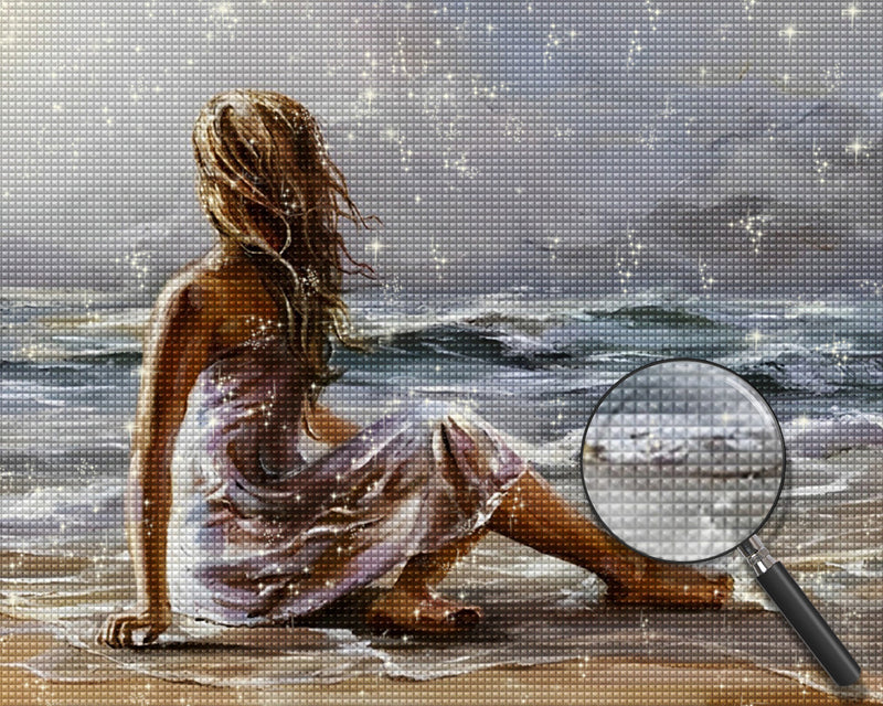 Eine am Strand sitzende Frau Diamond Painting