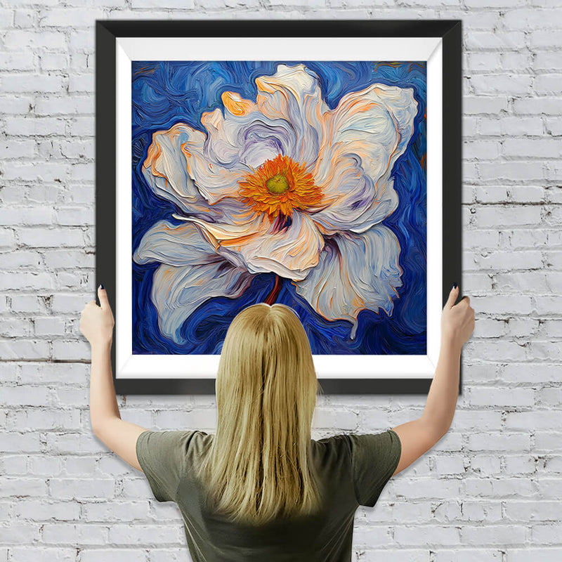 Eine weiße Blume mit orangenen Staubgefäßen Diamond Painting