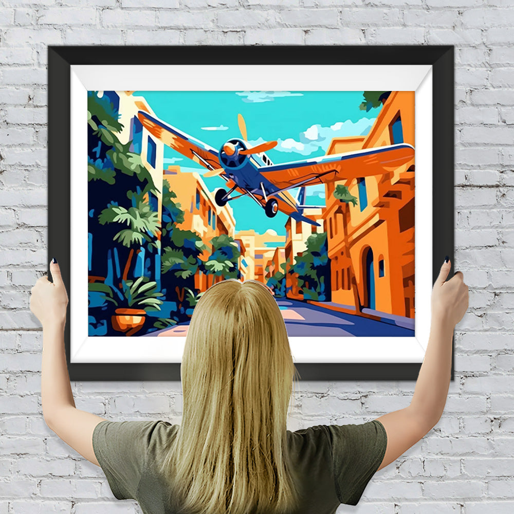 Flugzeug in der Stadt Diamond Painting