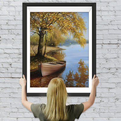 Fluss und Boot unter Baum im Herbst Diamond Painting