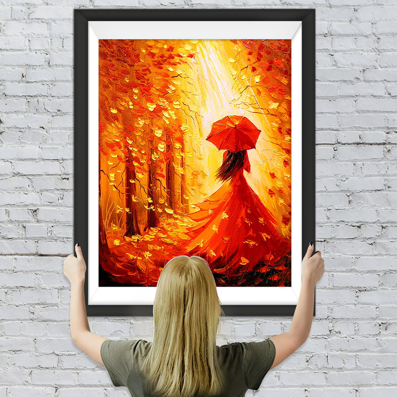 Frau mit einem roten Regenschirm im Herbstwald Diamond Painting