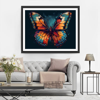 Grüner und oranger Schmetterling in der Dunkelheit Diamond Painting