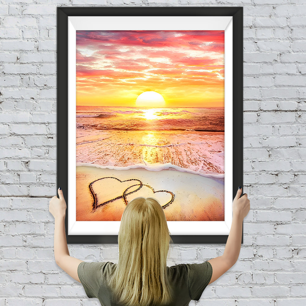 Herzförmiger Sandstrand und rosa Wolken Diamond Painting