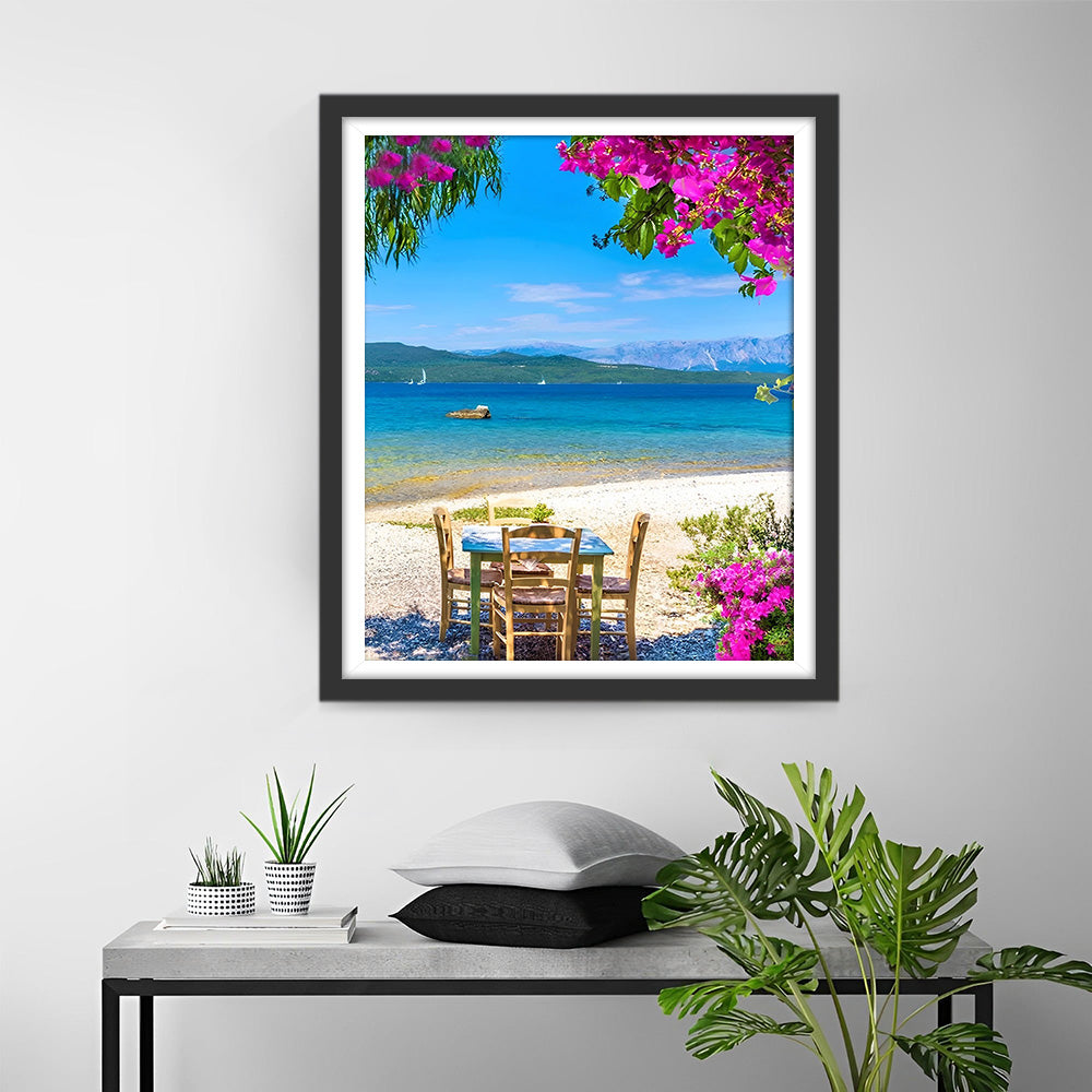 Holztisch und Stühle am Meer Diamond Painting