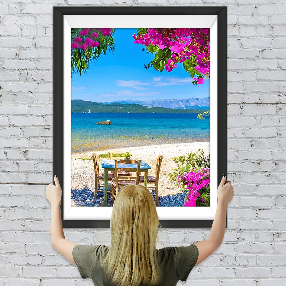 Holztisch und Stühle am Meer Diamond Painting