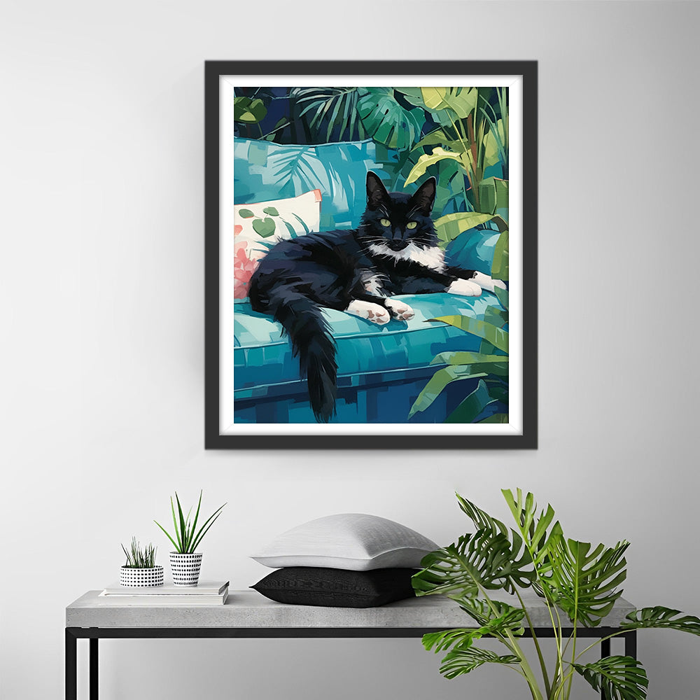 Schwarze Katze auf dem grünen Sofa Diamond Painting