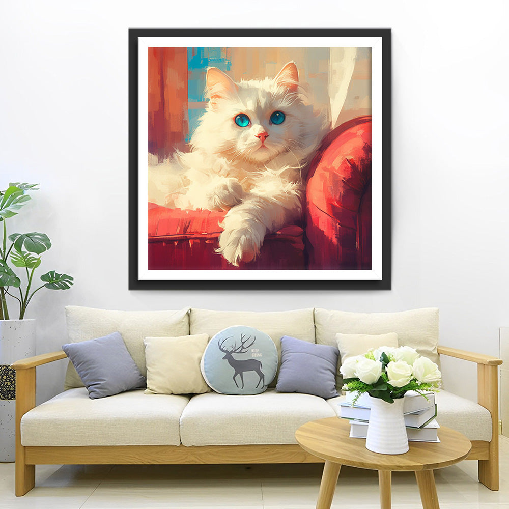 Weiße Katze auf rotem Sofa Diamond Painting