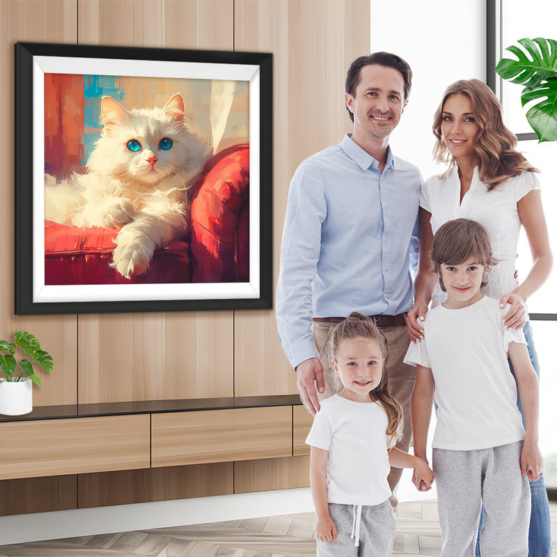 Weiße Katze auf rotem Sofa Diamond Painting