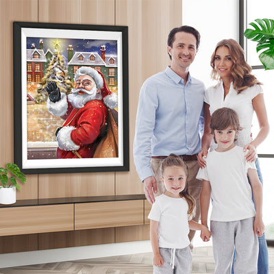 Winkender Weihnachtsmann vor dem Haus Diamond Painting