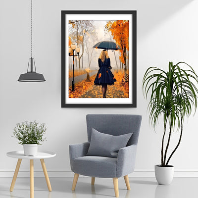 Frau mit Regenschirm im Herbst Diamond Painting