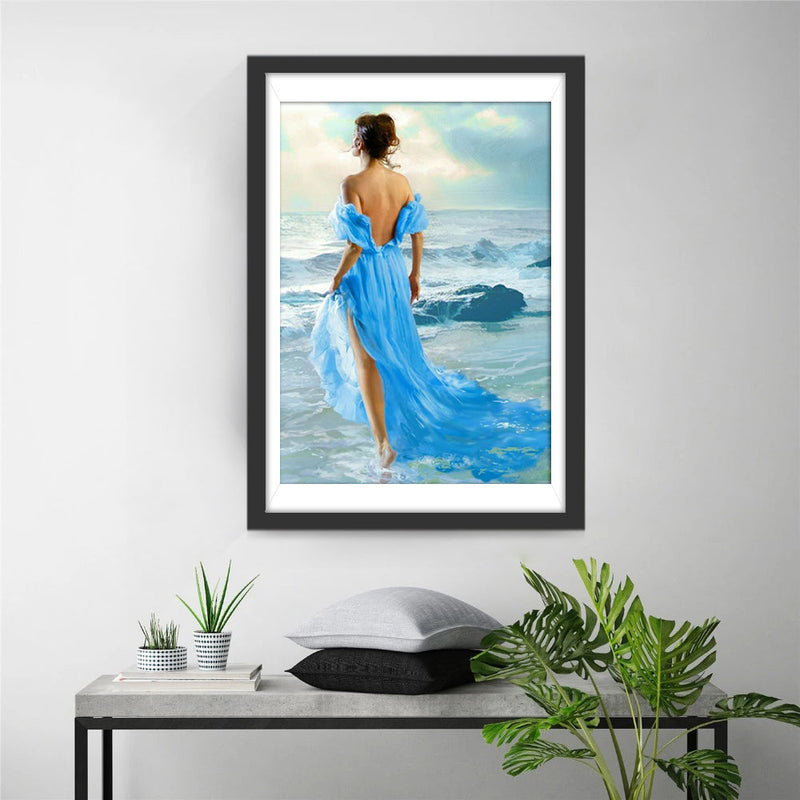 Schöne Frau im blauen Kleid am Meer Diamond Painting